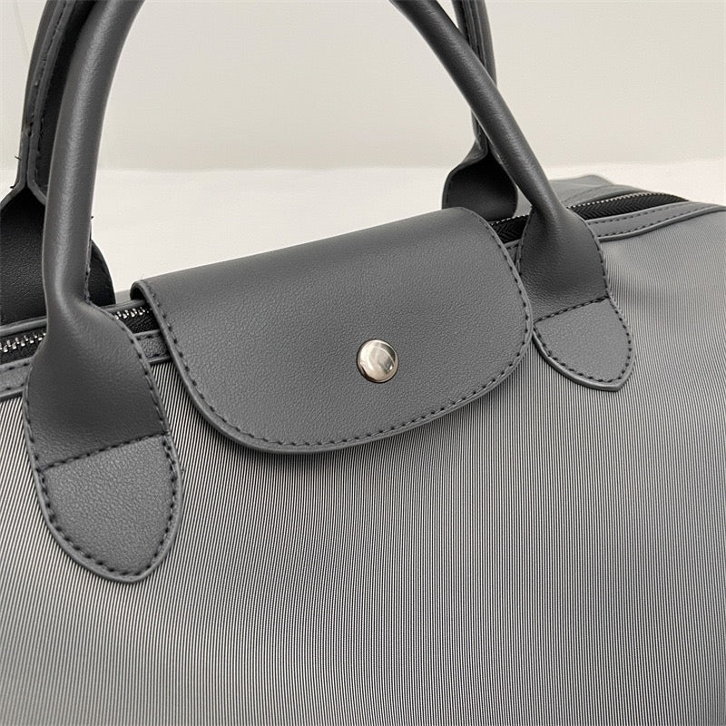 The Commuter Tote | Lightweight Nylon Barrel Bag | Effortlessly Global