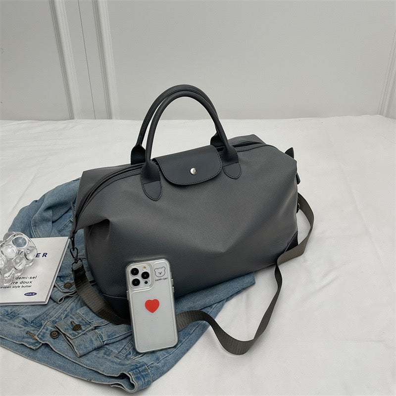 The Commuter Tote | Lightweight Nylon Barrel Bag | Effortlessly Global