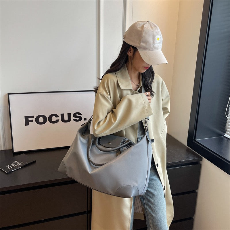 The Commuter Tote | Lightweight Nylon Barrel Bag | Effortlessly Global