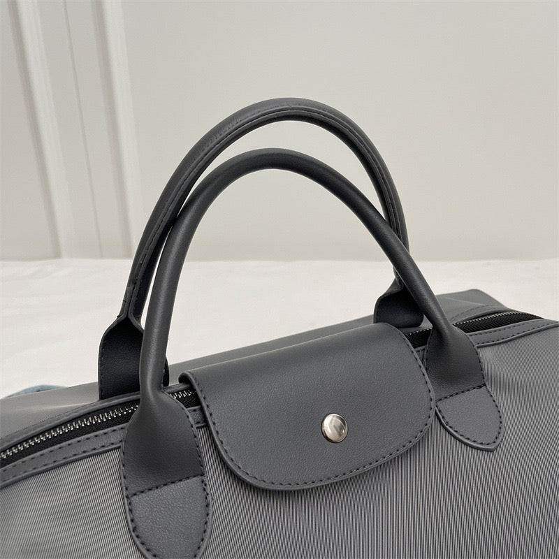 The Commuter Tote | Lightweight Nylon Barrel Bag | Effortlessly Global