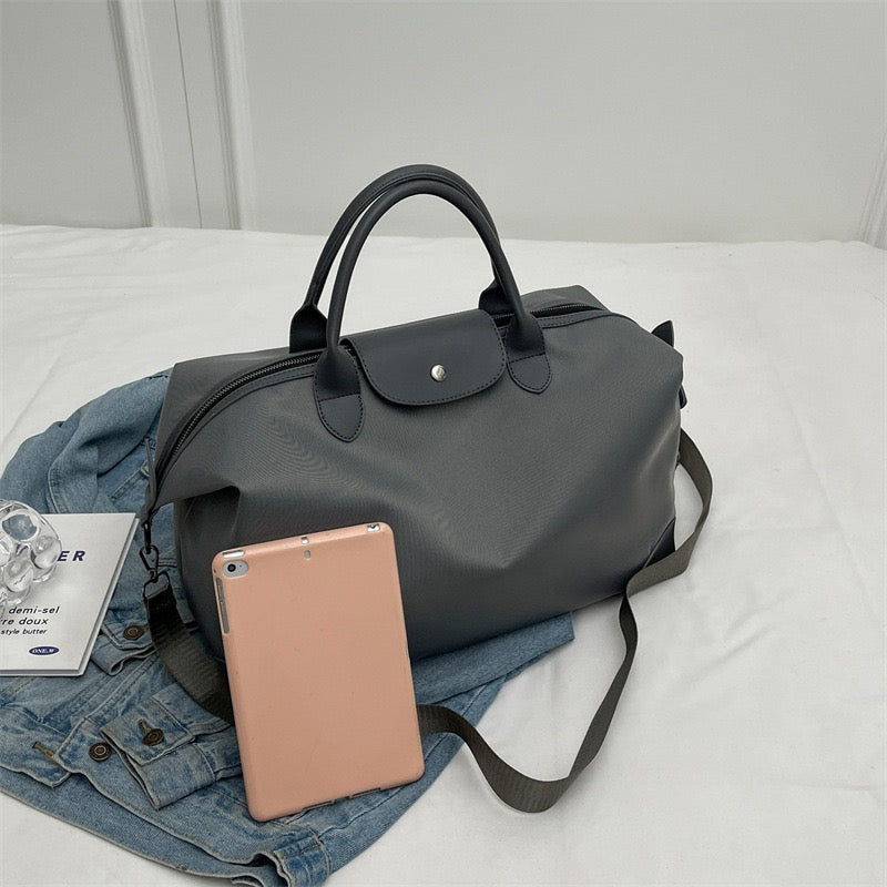 The Commuter Tote | Lightweight Nylon Barrel Bag | Effortlessly Global