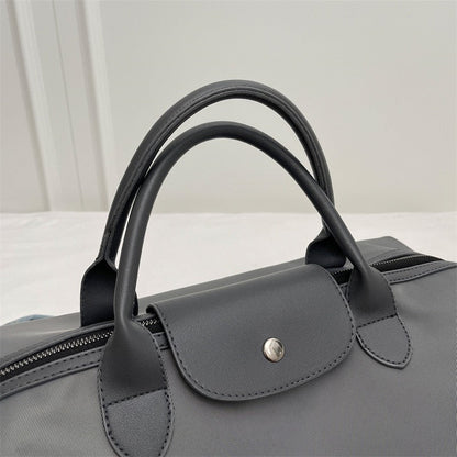 The Commuter Tote | Lightweight Nylon Barrel Bag | Effortlessly Global